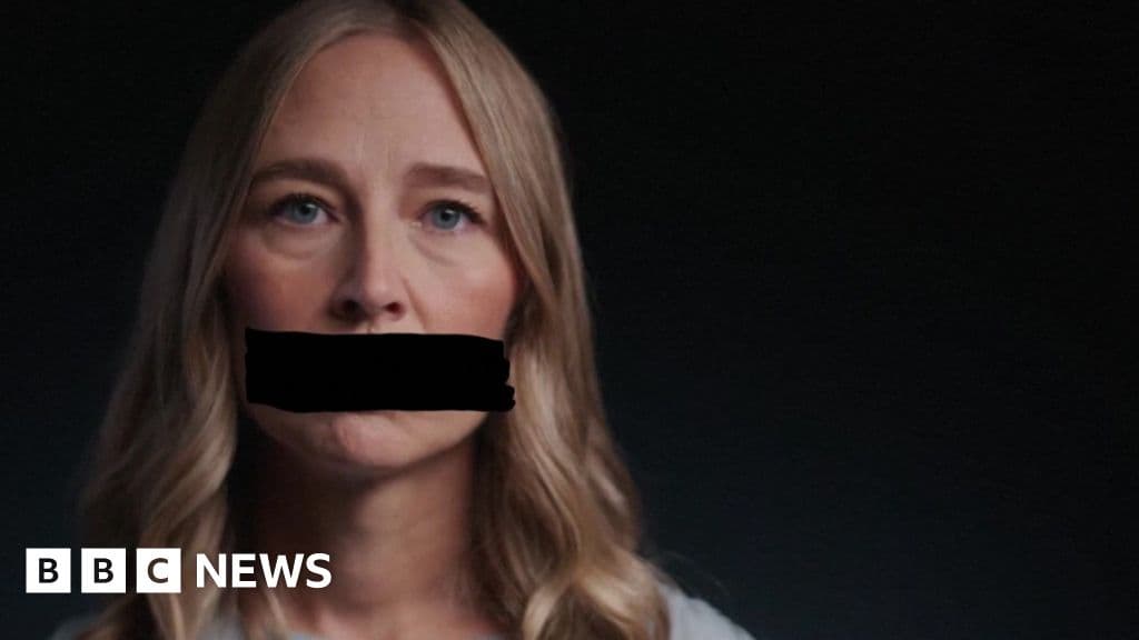 A close up photo of a stack of government documents on a wooden desk, heavily redacted with thick black marker lines completely obscuring the text, dim lighting, moody atmosphere, high contrast.