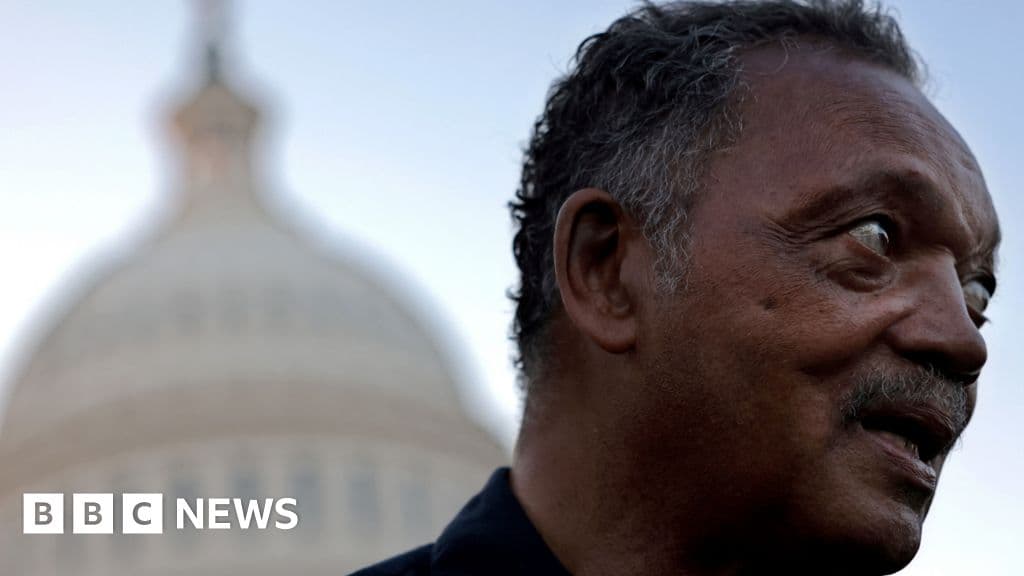 A gritty, high-contrast black and white illustration of a solitary microphone stand on an empty stage, with a mass of faceless figures in suits in the background holding up smartphones, drawn in a rough, sketch style.