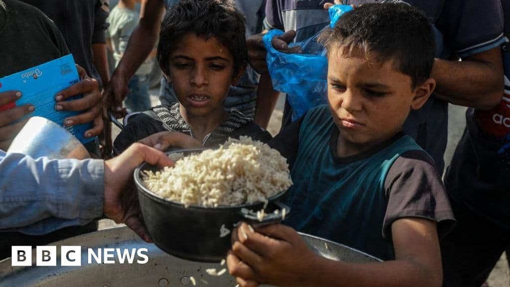 A gritty, high-contrast black and white photo of a wooden judge's gavel resting on a chaotic pile of legal documents and red tape, with a blurred background of a dusty, empty street.