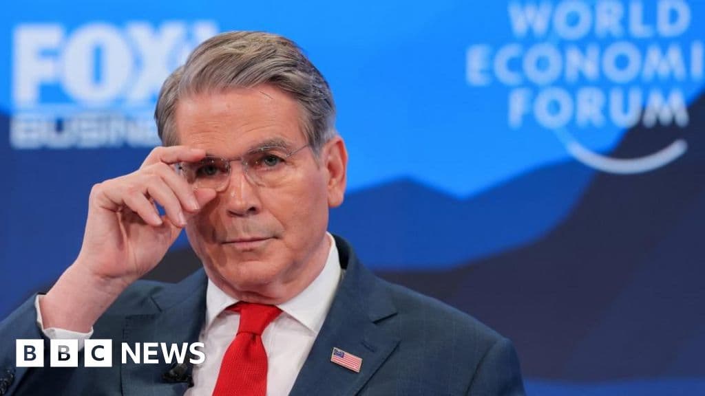 A satirical political cartoon style image showing a giant, greedy eagle wearing a suit and tie winking at a slice of cake shaped like Alberta, while a smaller, panicked beaver tries to hold the cake together with tape. The background is a map of North America that is cracking apart.