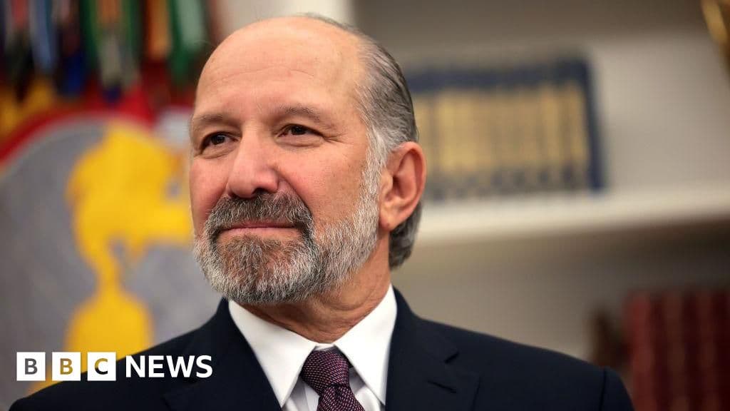 A highly stylized, satirical editorial illustration showing a classic, bland office email inbox on a computer screen. The emails are glowing with a toxic green light. In the background, faintly visible behind the computer screen, is a silhouette of a tropical island with storm clouds gathering above it. The style should be gritty and cynical, resembling political cartoon art or a dark graphic novel style. No text in the image.