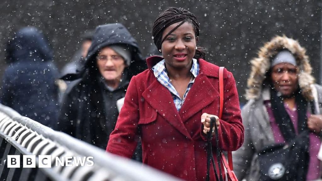 A satirical editorial cartoon of the Bank of England depicted as a crumbling, ancient temple. Inside, a group of elderly men in dusty suits are huddled around a giant, golden 'Interest Rate' dial that is actually a rigged carnival game. Outside the temple, a crowd of skeletal British citizens are begging for crumbs, while a 'Sold' sign hangs off a miniature, collapsing house. The atmosphere is gloomy, gray, and cynical.