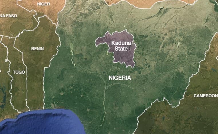 A desolate, dusty landscape in Kaduna at twilight, featuring a single, tattered paper list of names impaled on a thorn bush, with the blurred, dark silhouette of an empty, skeletal church building in the far distance under a blood-orange and grey sky.
