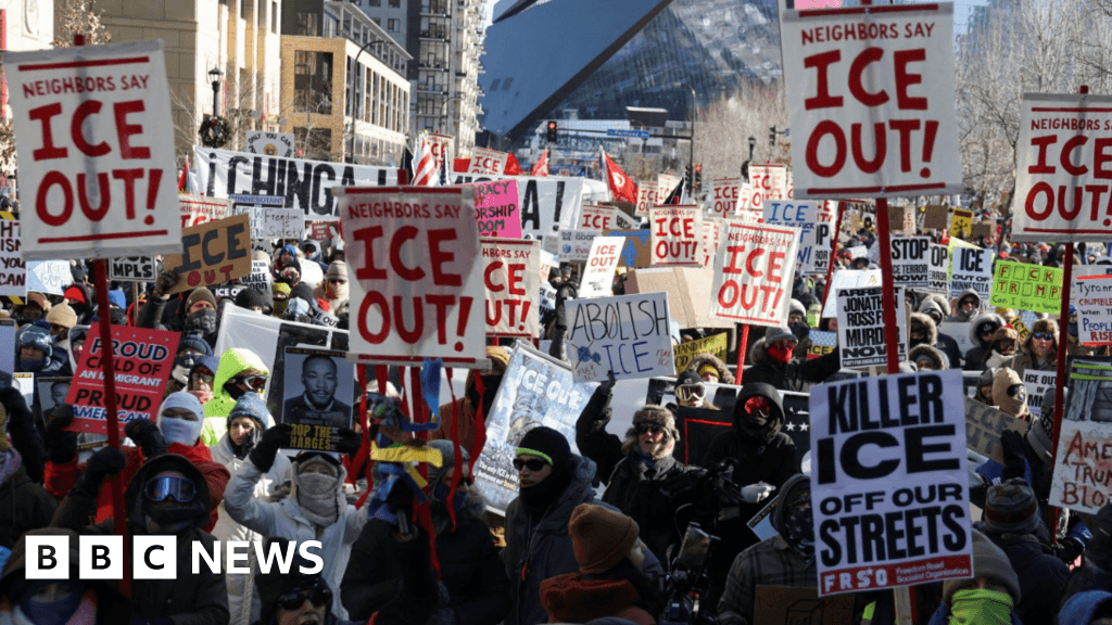 A gritty, black and white photo of a snowy street in Minnesota. A small storefront has a 'CLOSED' sign hanging crookedly in the window. The street is empty. In the background, blurred, a generic government SUV sits idling with its lights off. The atmosphere is cold and abandoned.