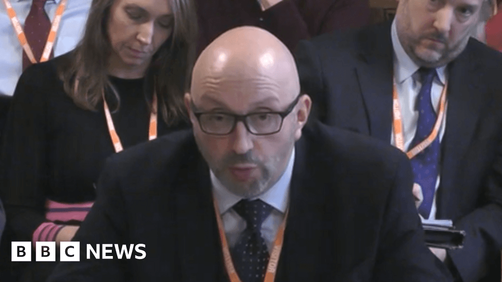 A cynical, high-contrast editorial illustration showing a bloated businessman in a luxury suit sitting on a golden throne made of rusted, leaking water pipes. Below him, a politician in a drab grey suit wagging a tiny, limp finger. The background is a murky, sewage-colored landscape of a flooded British town under a gloomy sky. Sharp, jagged lines and a muted, sickly color palette.