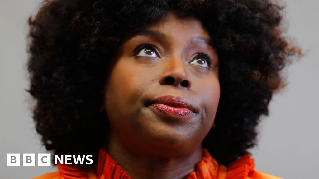 A gritty, satirical illustration of a golden stethoscope draped over a pile of dusty, bureaucratic files in a crumbling Nigerian government office, harsh dramatic lighting, editorial cartoon style.