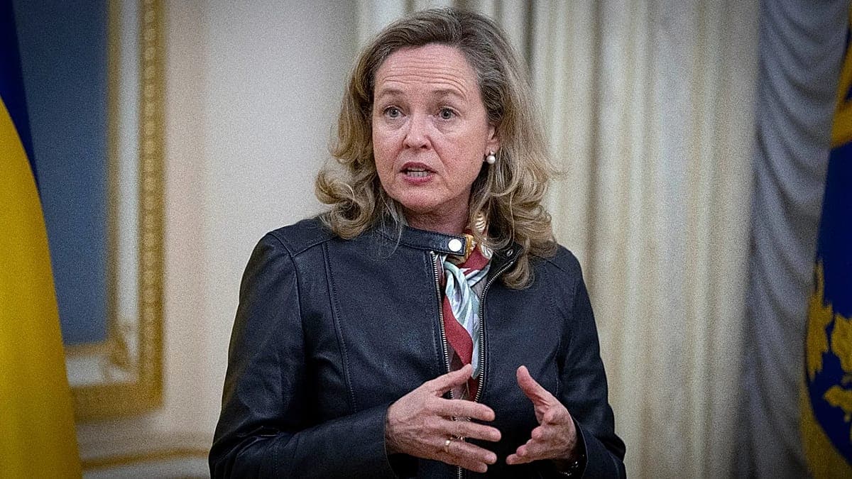 A satirical cinematic wide shot of European leaders sitting around a giant, crumbling circular table made of stacks of paper. In the center of the table is a tiny, flickering hologram of Donald Trump. Nadia Calviño is standing on a chair, pointing a feather pen at the hologram. The room is a decadent, decaying 18th-century palace hall with 'EXIT' signs in neon, and the leaders are wearing expensive suits but also inflatable life vests. The lighting is dim and dusty.