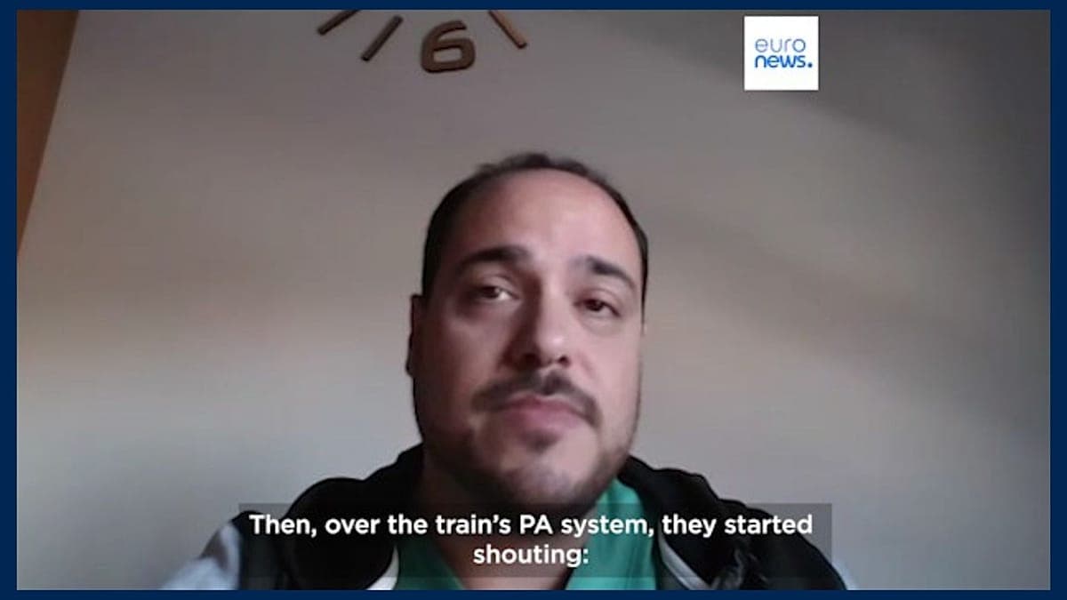 A gritty, hyper-realistic wide shot of a derailed high-speed train in a bleak, rural Spanish landscape. The twisted metal is illuminated by the harsh, cold light of a setting sun. In the foreground, a single, mud-stained medical bag sits abandoned near a cracked concrete rail tie. The atmosphere is heavy, cynical, and somber, with dark storm clouds gathering on the horizon.