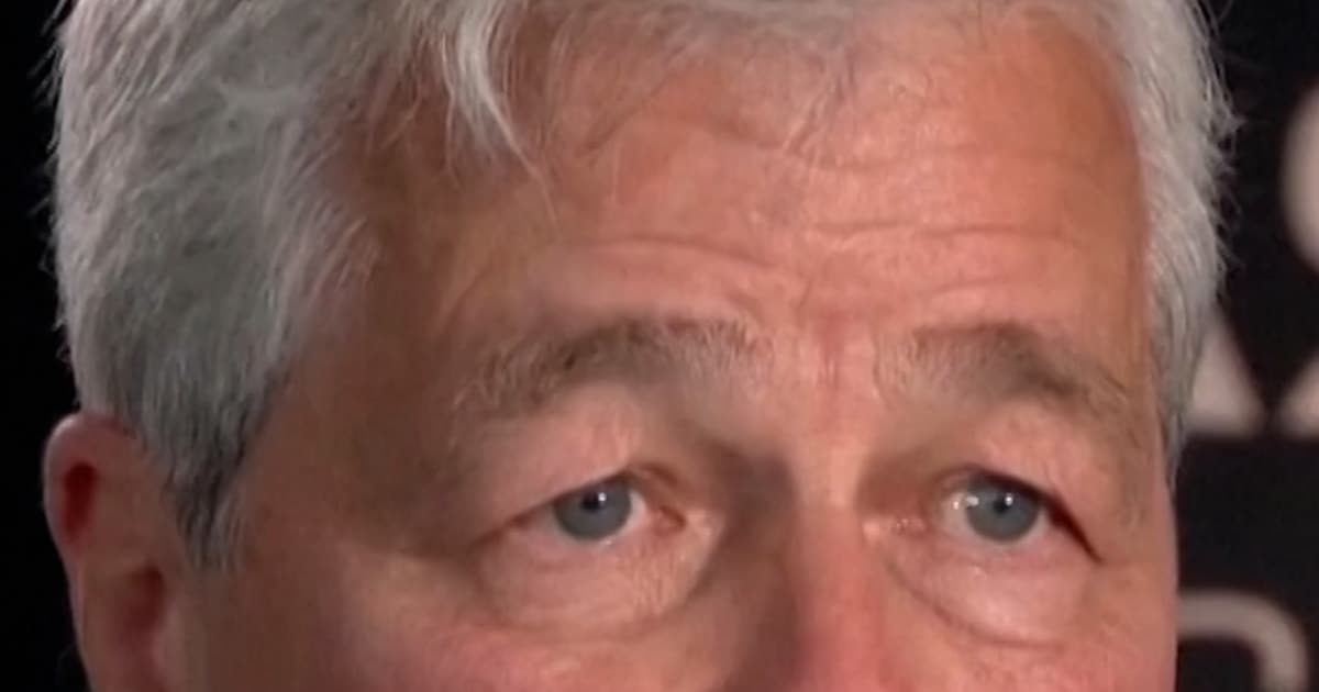 A gritty editorial cartoon showing a giant, orange-tinted man in a suit and a gray-haired banker wrestling over a massive glowing '5B' symbol inside a gold-plated cage, while a crowd of tired, thin people watch from the shadows, in the style of dark political satire.