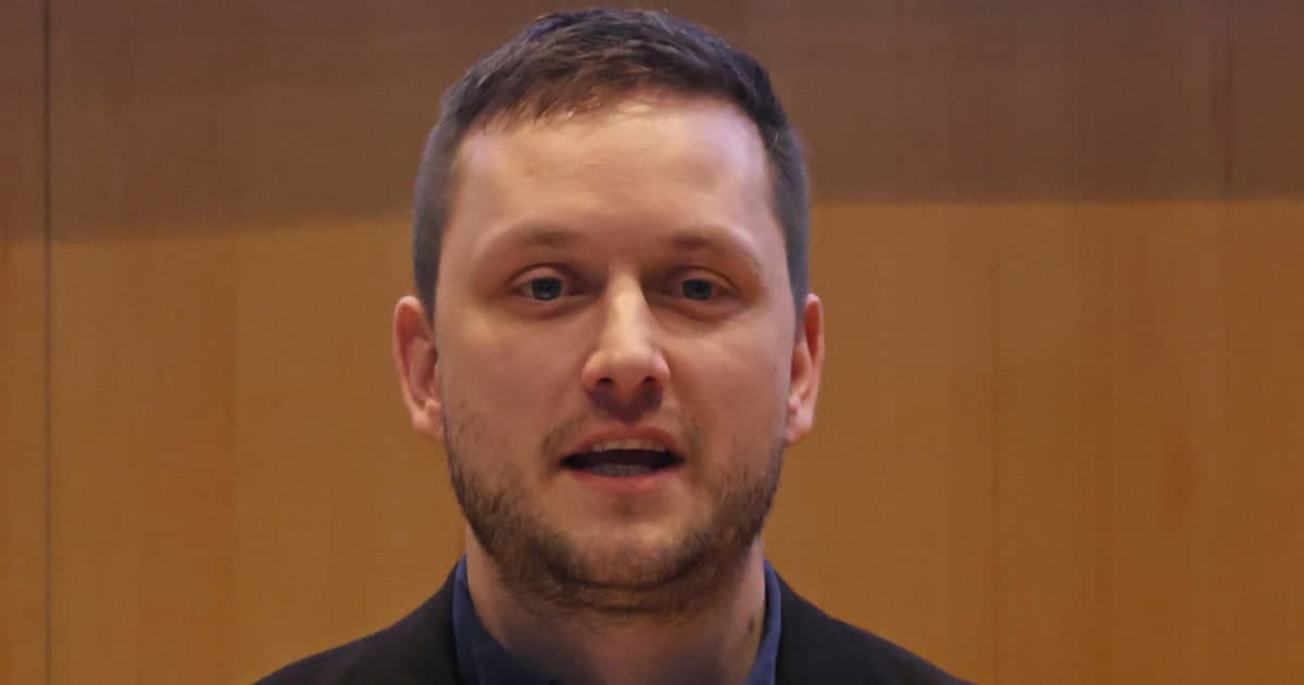 A satirical, high-contrast digital painting of a tiny, dignified man in a suit standing on a small, melting ice floe in the middle of a vast dark ocean. He is holding a tiny flag that says 'NOT FOR SALE' while three massive, shadowy silhouettes of eagles, bears, and dragons loom in the background fog, looking down at him. The style is sophisticated, dark, and ironic, like an editorial illustration for a high-end European magazine.