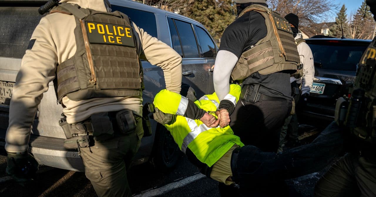 A sterile, high-tech map of the American Midwest (Minnesota, Wisconsin, Illinois, Iowa, Nebraska) with glowing blue logistics lines connecting dark, windowless warehouse buildings. The aesthetic is cold, bureaucratic, and dystopian, reminiscent of a corporate logistics presentation for a prison system.