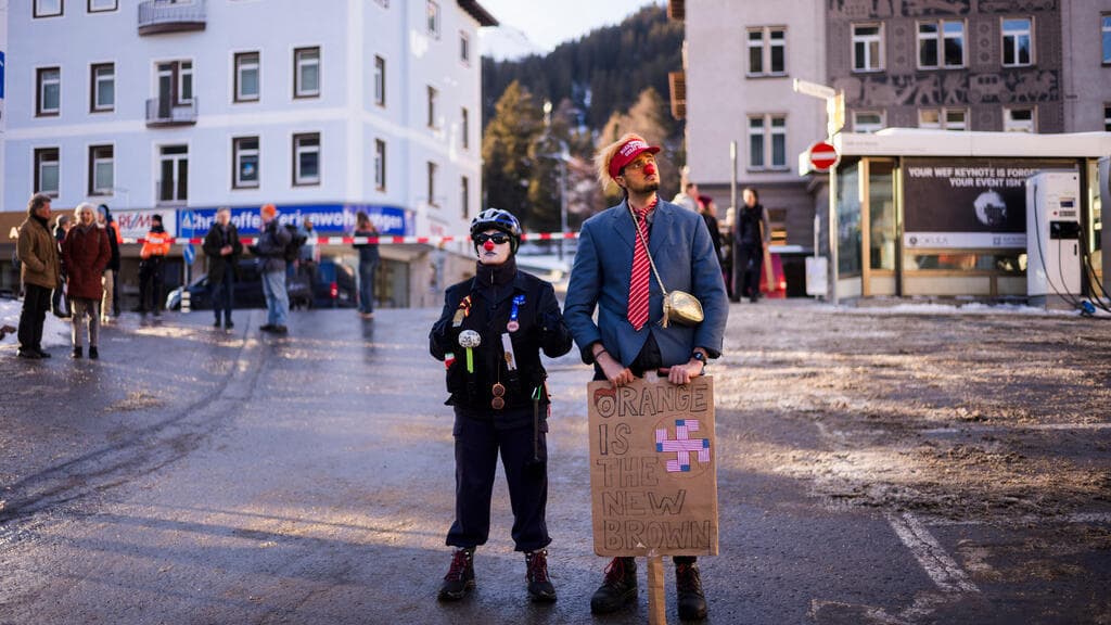 A hyper-cynical digital painting of a Swiss mountain peak that transitions into a giant, overflowing pile of gold coins. At the summit, tiny figures in suits are clinking champagne glasses while private jets circle like vultures in a dark, smoggy sky. Below, a group of people in rags are holding a banner that says 'STAKEHOLDER CAPITALISM' while digging into the snow for scraps. High contrast, sharp shadows, satirical caricature style.