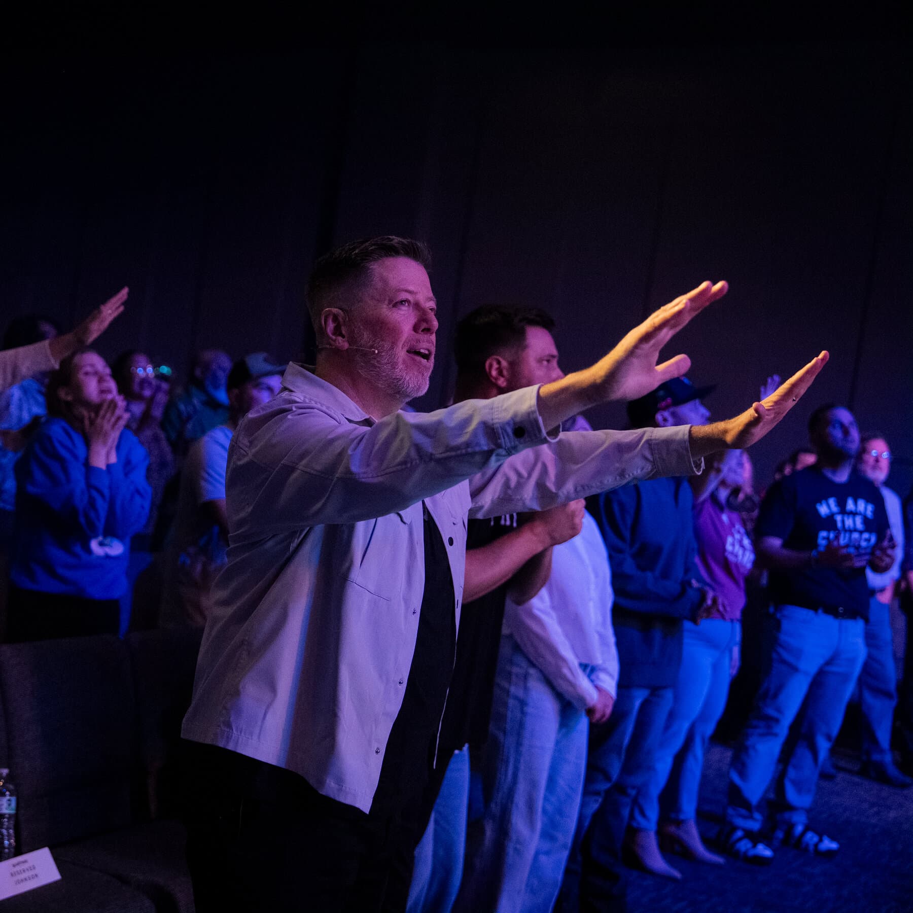 A satirical surrealist oil painting in the style of Hieronymus Bosch depicting a chaotic scene inside the Oval Office. A large golden calf wearing a long red tie sits behind the resolute desk. Around the desk, men in expensive suits with exaggerated smiles are bowing and offering plates of cash. In the background, the walls are melting, and a stained glass window depicts a dollar sign instead of a cross. The lighting is dramatic and hellish.