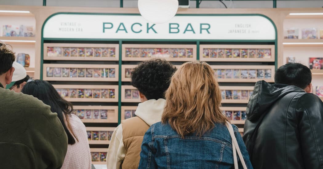 A gritty, high-contrast noir-style image of a dark New York alleyway. In the center, a single, glowing, holographic trading card featuring a cartoon monster lies in a puddle of dirty water. Behind it, the blurred silhouette of a person in a hoodie runs into the shadows. The lighting is harsh and cynical, emphasizing the contrast between the childish toy and the decaying urban environment.