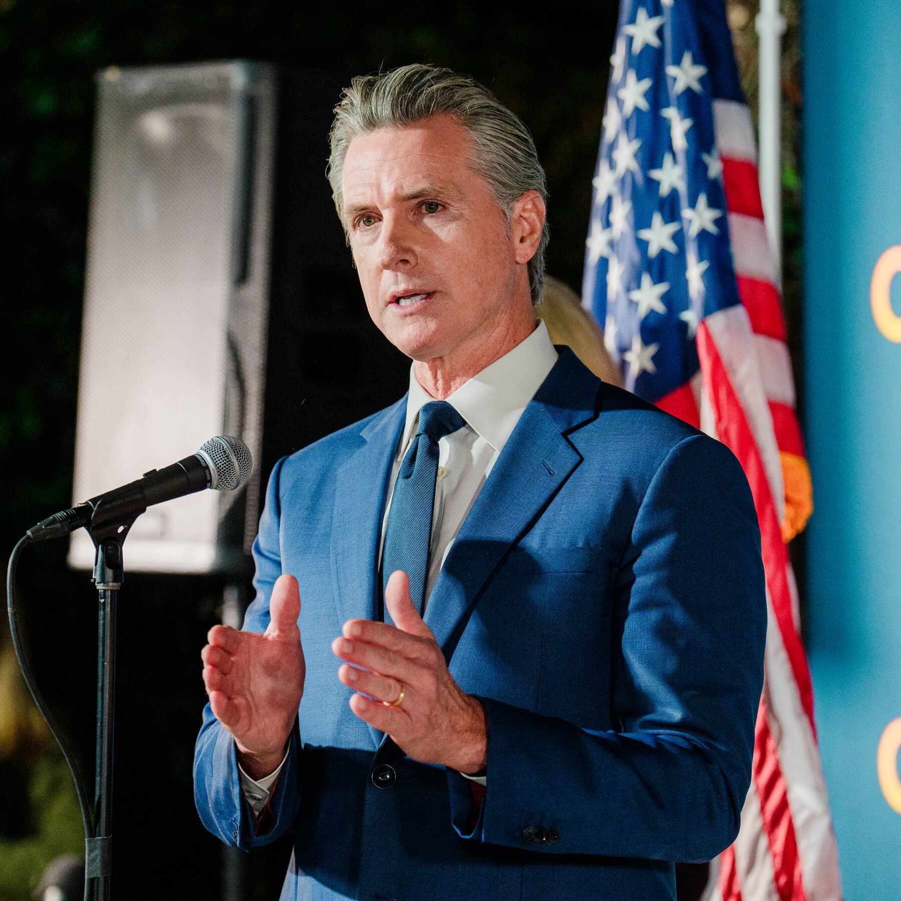 A cynical, tired man in a dark suit sitting at a typewriter in a smoky room, looking at a distorted, melting map of California, dark noir aesthetic, hyper-realistic, gritty, with scales of justice in the background tilted to one side.