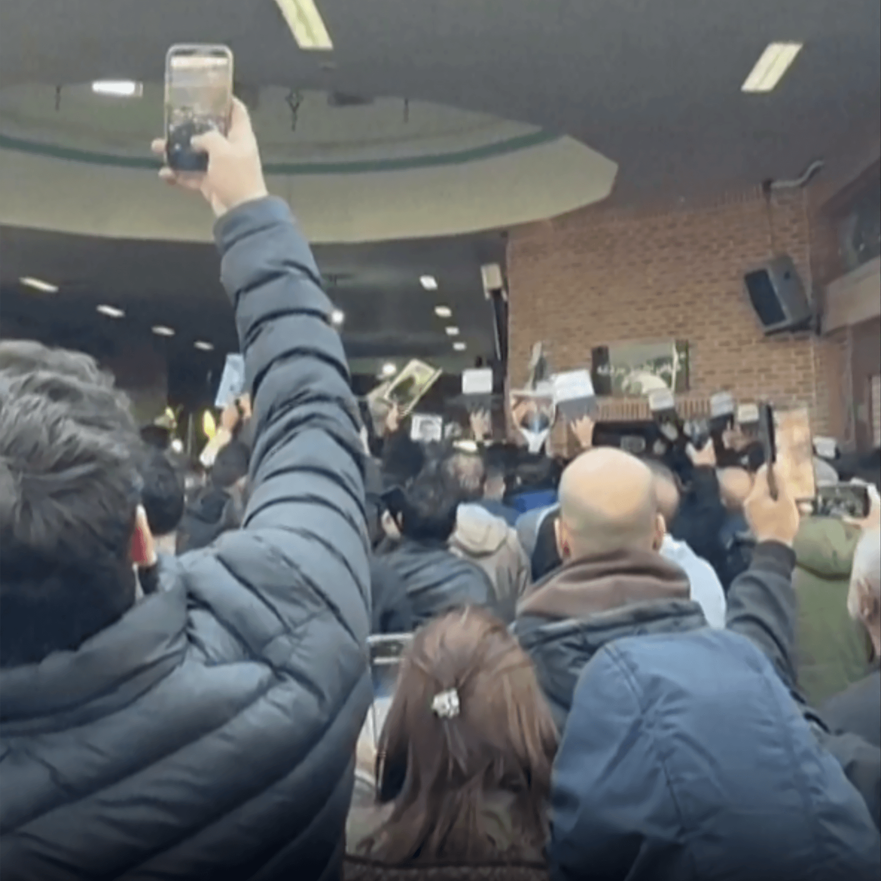 A moody, high-contrast black and white illustration of a vast cemetery in Tehran. In the foreground, a single cracked tombstone with a wilted flower. In the background, blurry, looming shadows of security figures watching over the graves. The sky is heavy and gray.