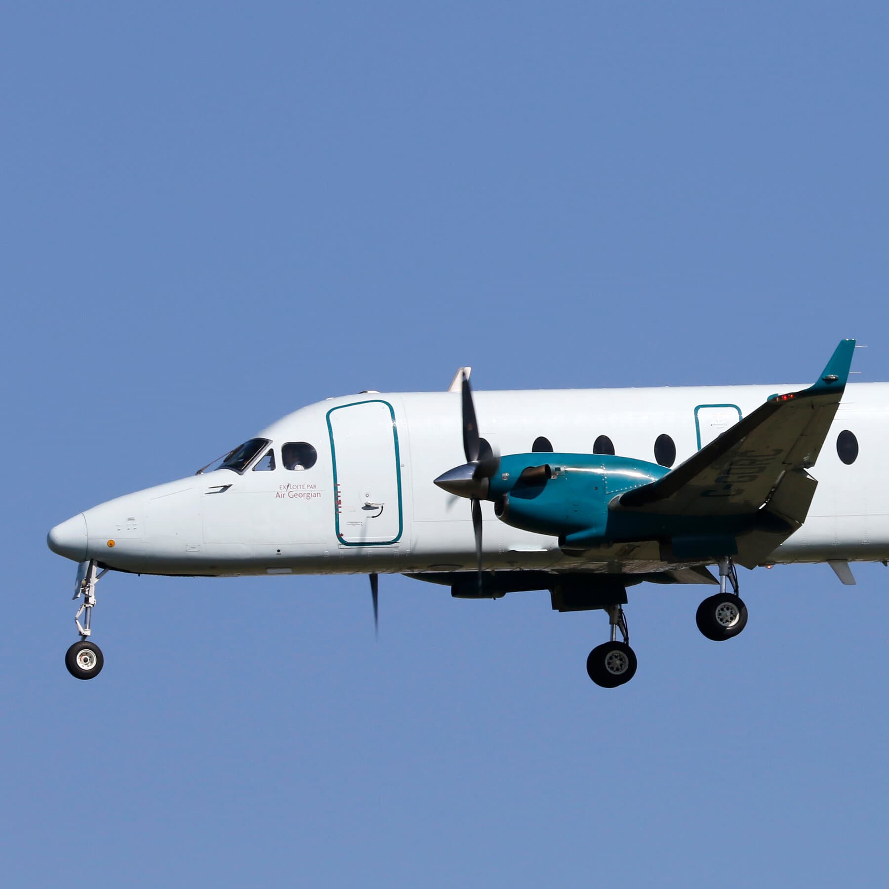A hyper-realistic, gritty image of a dense, dark Colombian jungle landscape under heavy rain. In the distance, a thin plume of black smoke rises from the trees, barely visible against the grey sky. No people, no wreckage visible, just the unforgiving and vast nature. The mood is somber, cynical, and isolating.