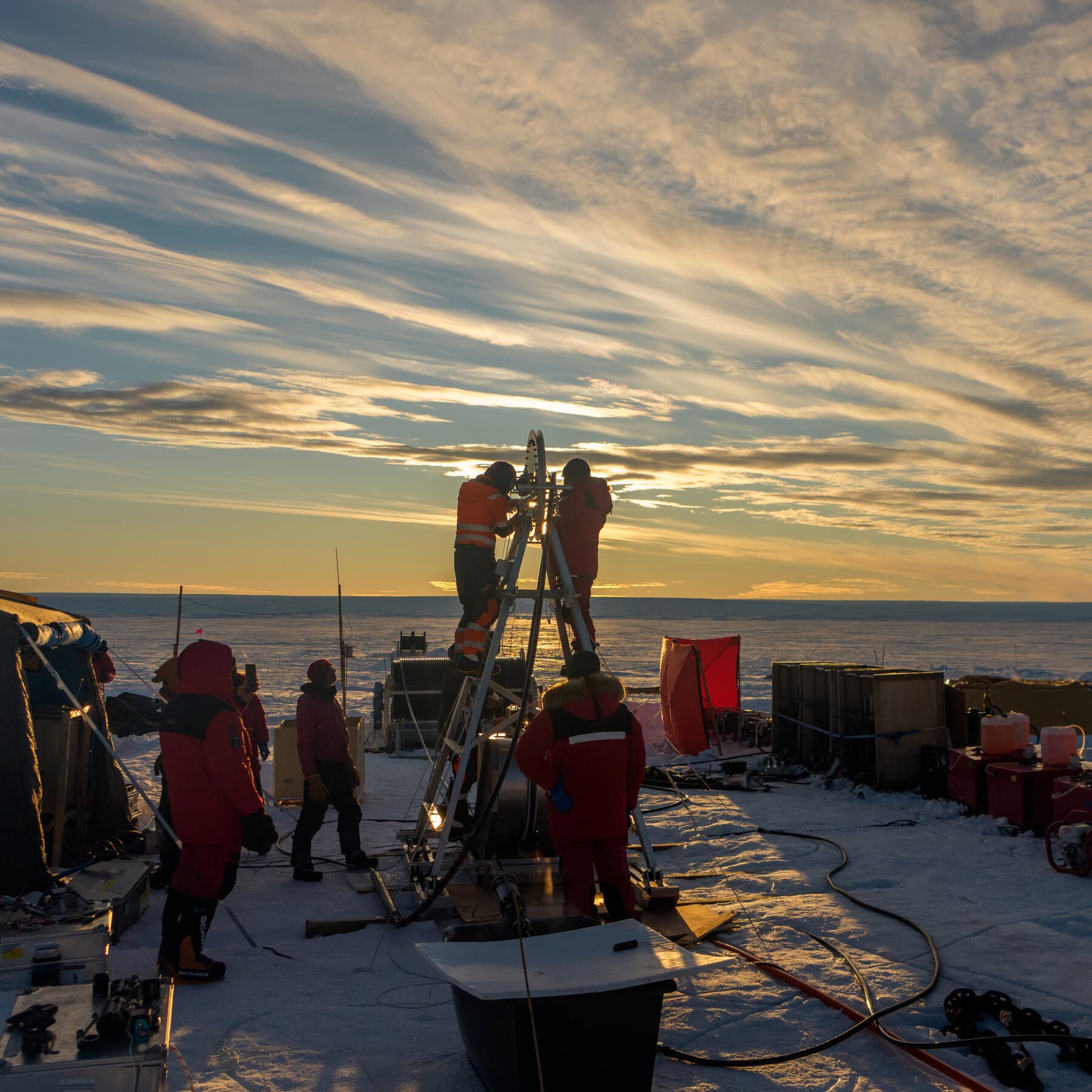 A highly realistic, gritty image of a yellow scientific underwater drone tangled and frozen within jagged, dark blue glacial ice deep underwater. The lighting is dim and ominous. The drone looks abandoned and small against the massive, crushing weight of the ice. No humans, just the lost technology in a hostile frozen environment.