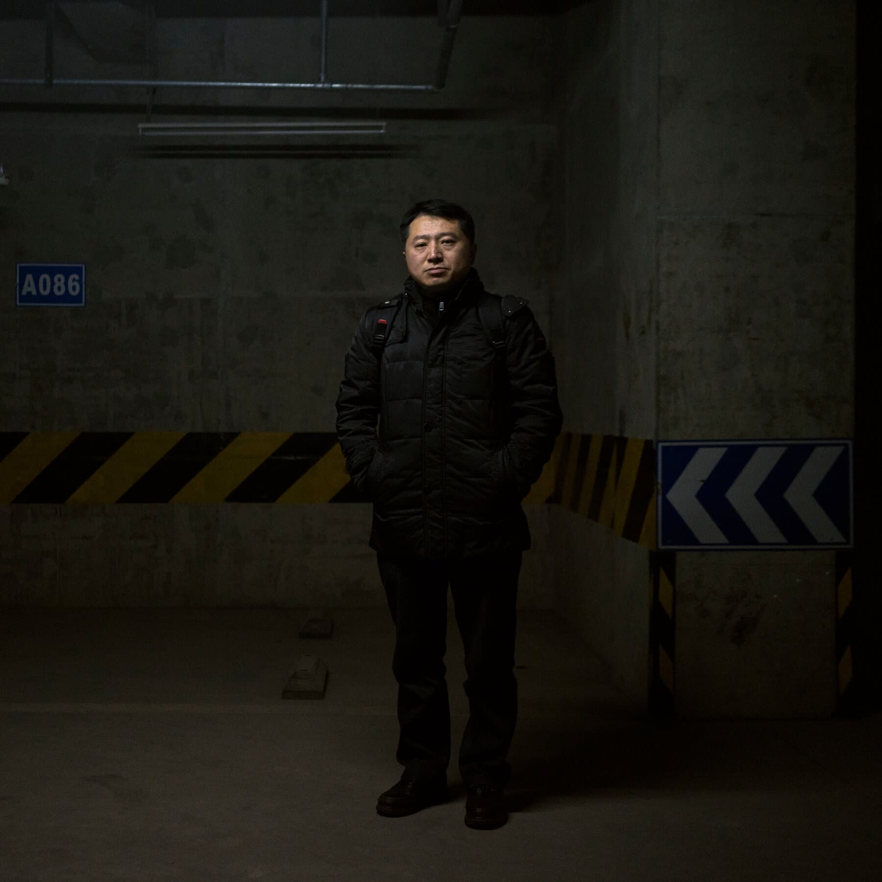 A solitary, vintage typewriter sitting on a wooden desk in a dimly light room, heavily wrapped in thick, restrictive red tape, with a single blank page, photorealistic, cinematic lighting, moody atmosphere.
