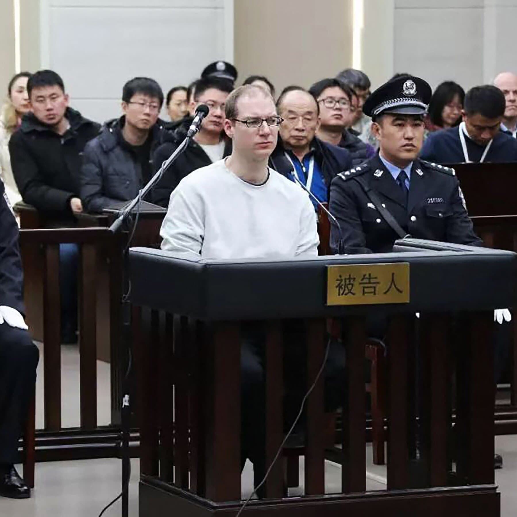 A conceptual illustration of a courtroom gavel transforming into a poker chip on a table, with blurred flags of China and Canada in the background, dark moody lighting, high contrast, cynical art style.