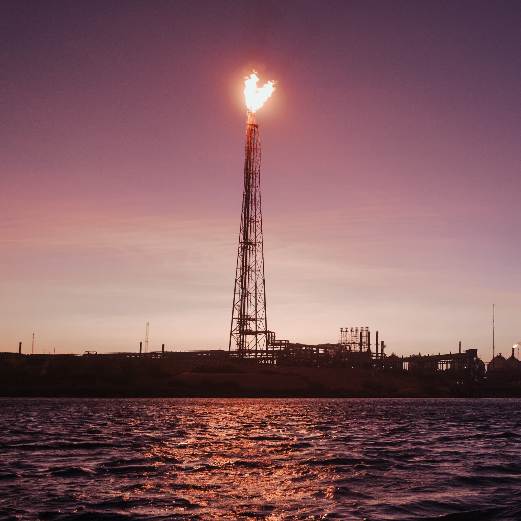 A gritty, high-contrast illustration of a heavy oil barrel sitting on a polished wooden desk in the Oval Office, dramatic lighting, noir style, digital art.