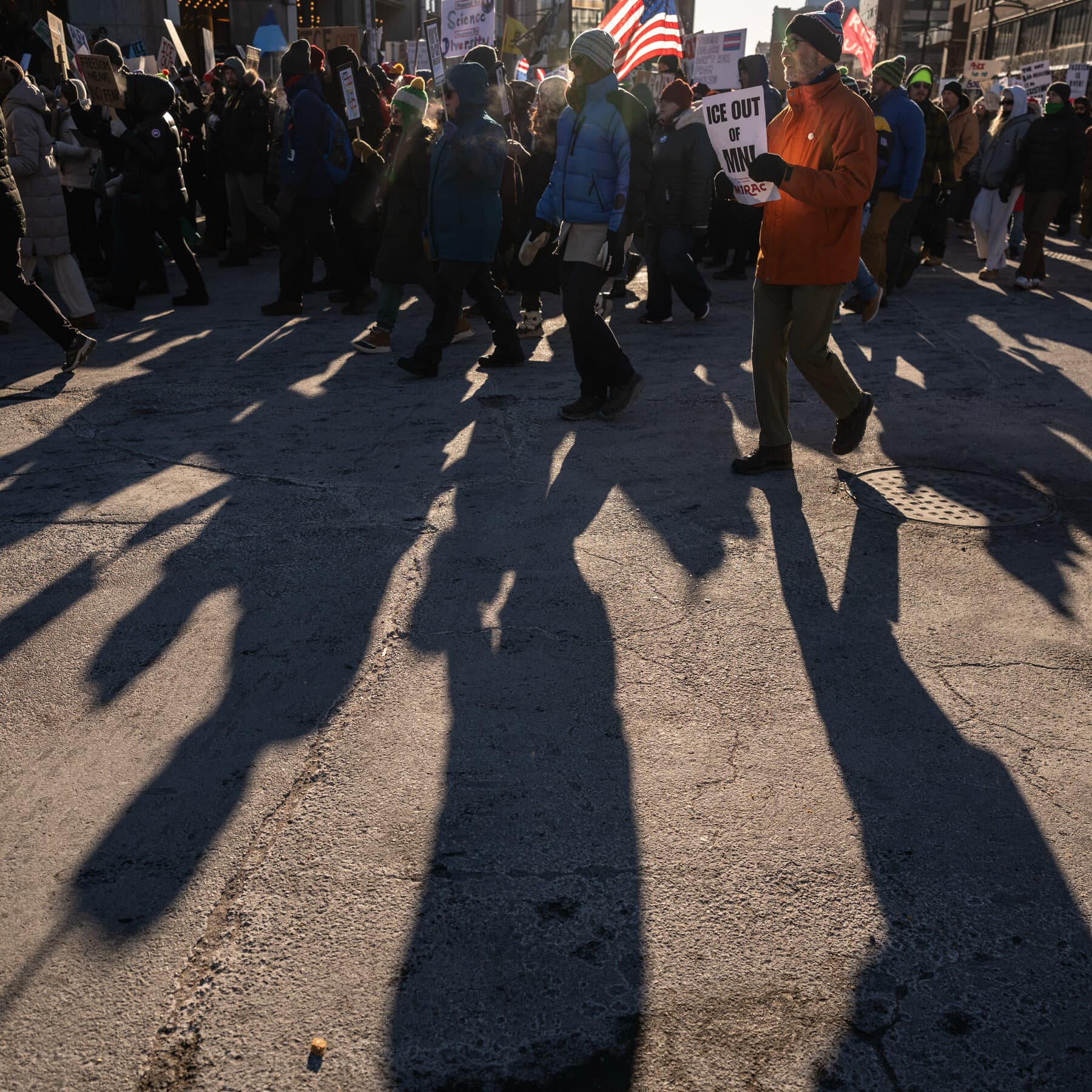 A gritty, minimalist illustration of a giant stone ear listening to a small, glowing smartphone in a dark room. The style should be cynical and bleak, focusing on surveillance.