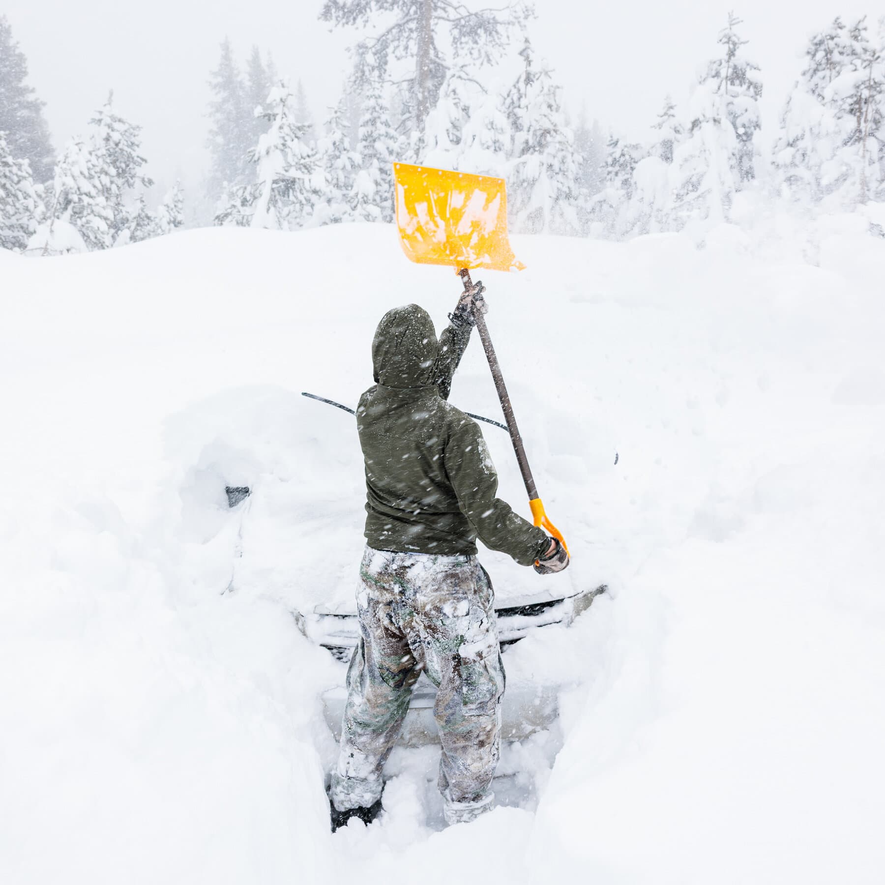 A desolate, high-contrast black and white photograph of a steep snowy mountain slope after an avalanche. In the foreground, a single broken ski pole sticking out of the debris. The sky is grey and oppressive. No people visible. Stark, cold, and ominous atmosphere.