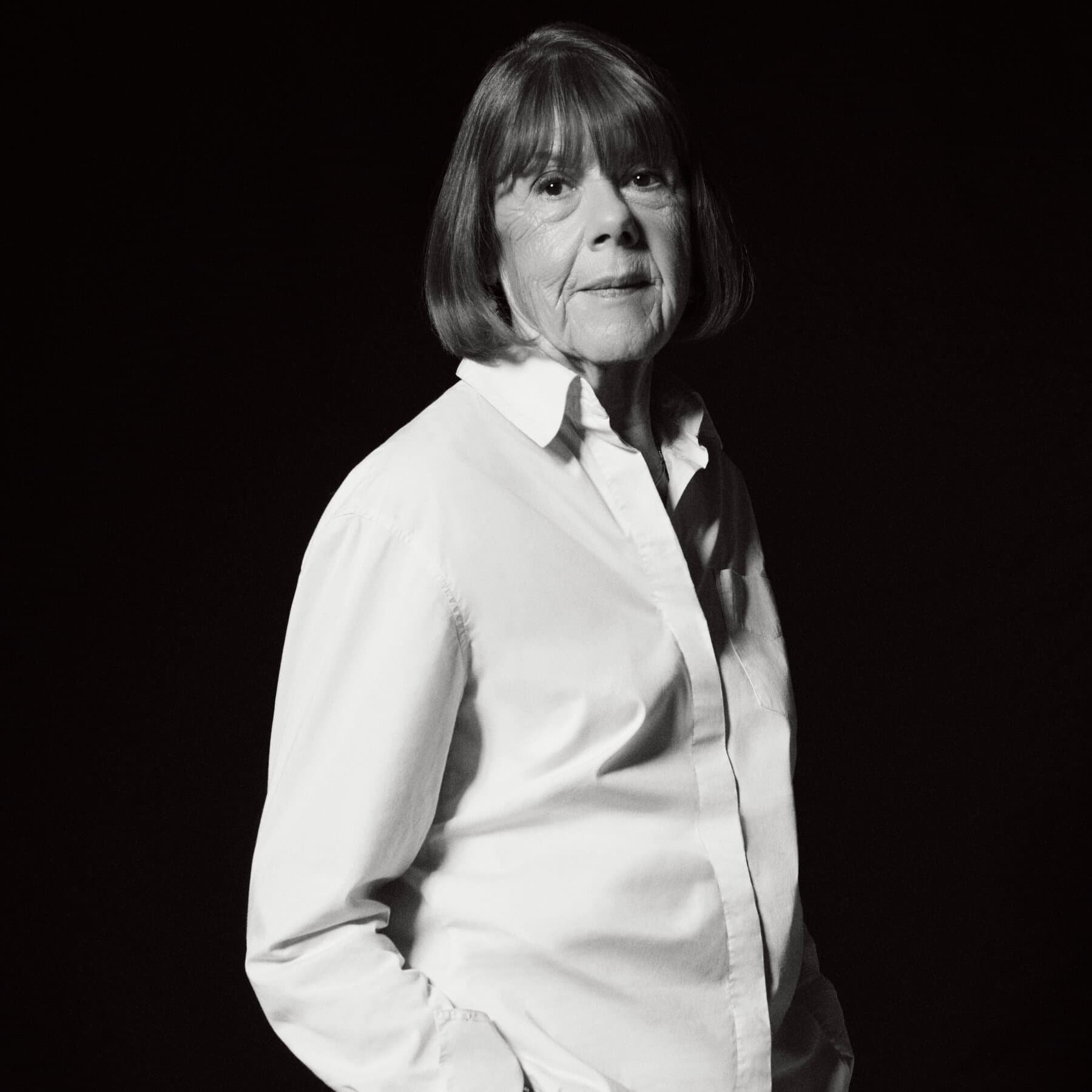 A shattered white porcelain mask lying on a clean wooden dining table, harsh dramatic lighting, gritty realistic texture, dark background, symbolism of broken trust.