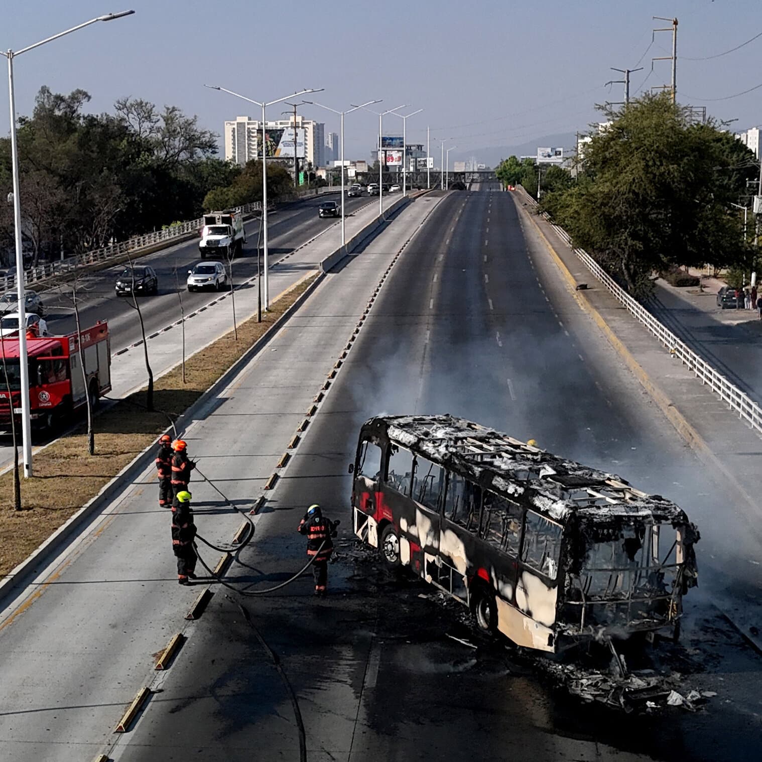 A gritty, cinematic conceptual image representing a power vacuum. In the center, a rough, empty concrete throne sits in a dim, dusty room. A discarded, tarnished crown lies on the floor. In the shadows surrounding the throne, dozens of indistinguishable, dark silhouettes of men in tactical gear are stepping forward, all reaching toward the empty seat. The lighting is moody and low-contrast, emphasizing a cycle of endless conflict and the grim reality of succession. High resolution, photorealistic style.