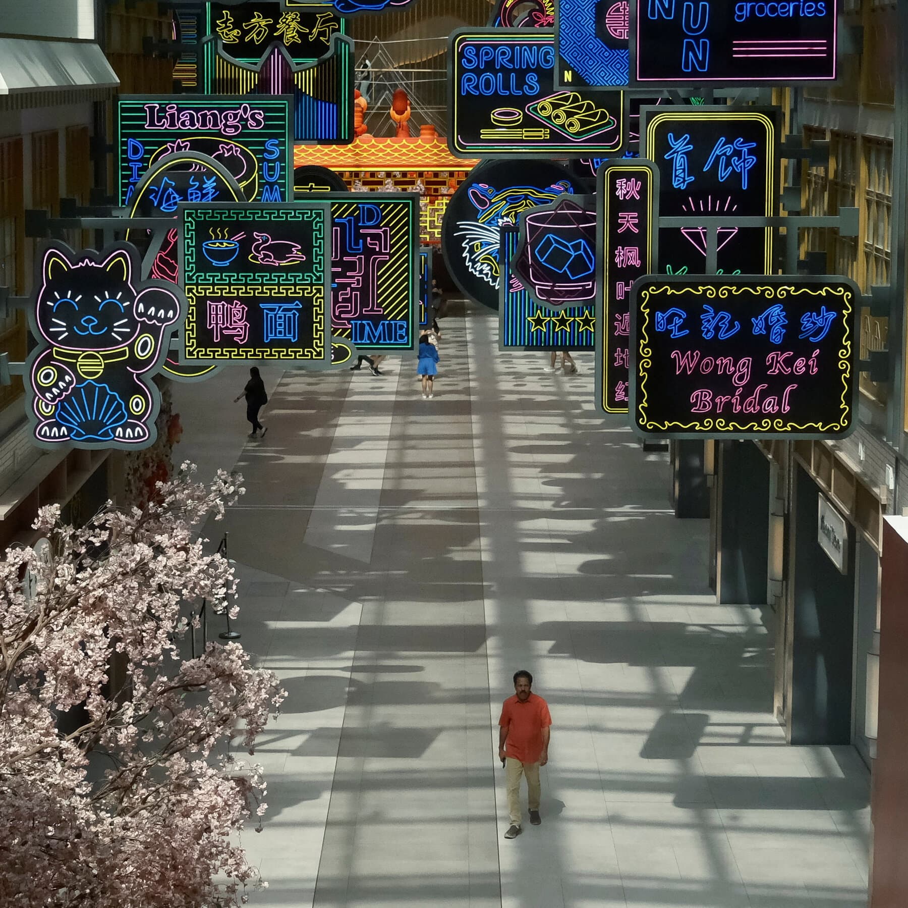 A hyper-realistic, cynical conceptual image depicting a pristine, high-end shopping mall corridor with polished marble floors. In the reflection of the glass storefronts, instead of shoppers, there are faint, chaotic scenes of a stormy, fiery sky, symbolizing the turmoil outside. The mall itself is empty and sterile, bathed in cold, artificial light.
