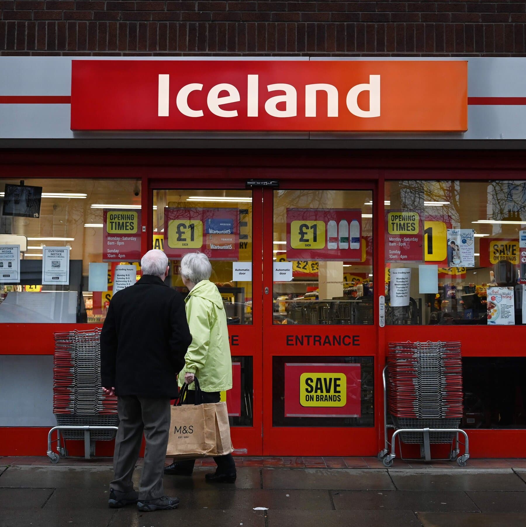 A gritty, cynical illustration of a frozen food aisle in a cheap supermarket crashing into a rugged, snowy landscape with a volcano. High contrast, depressing colors.