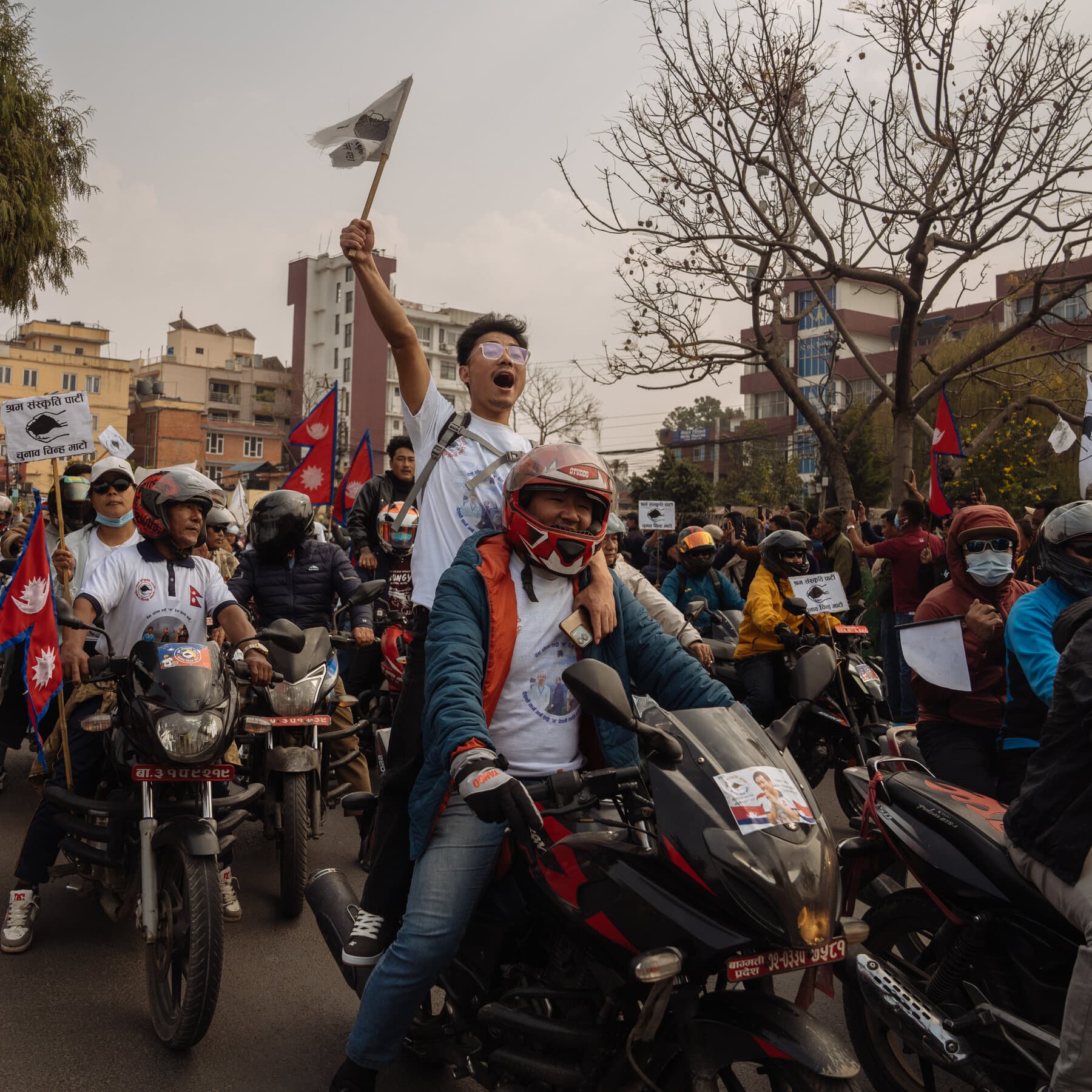 A dusty, battered ballot box sitting alone on a cold stone street in Nepal, dark moody lighting, cynical atmosphere, no people, hyper-realistic style.