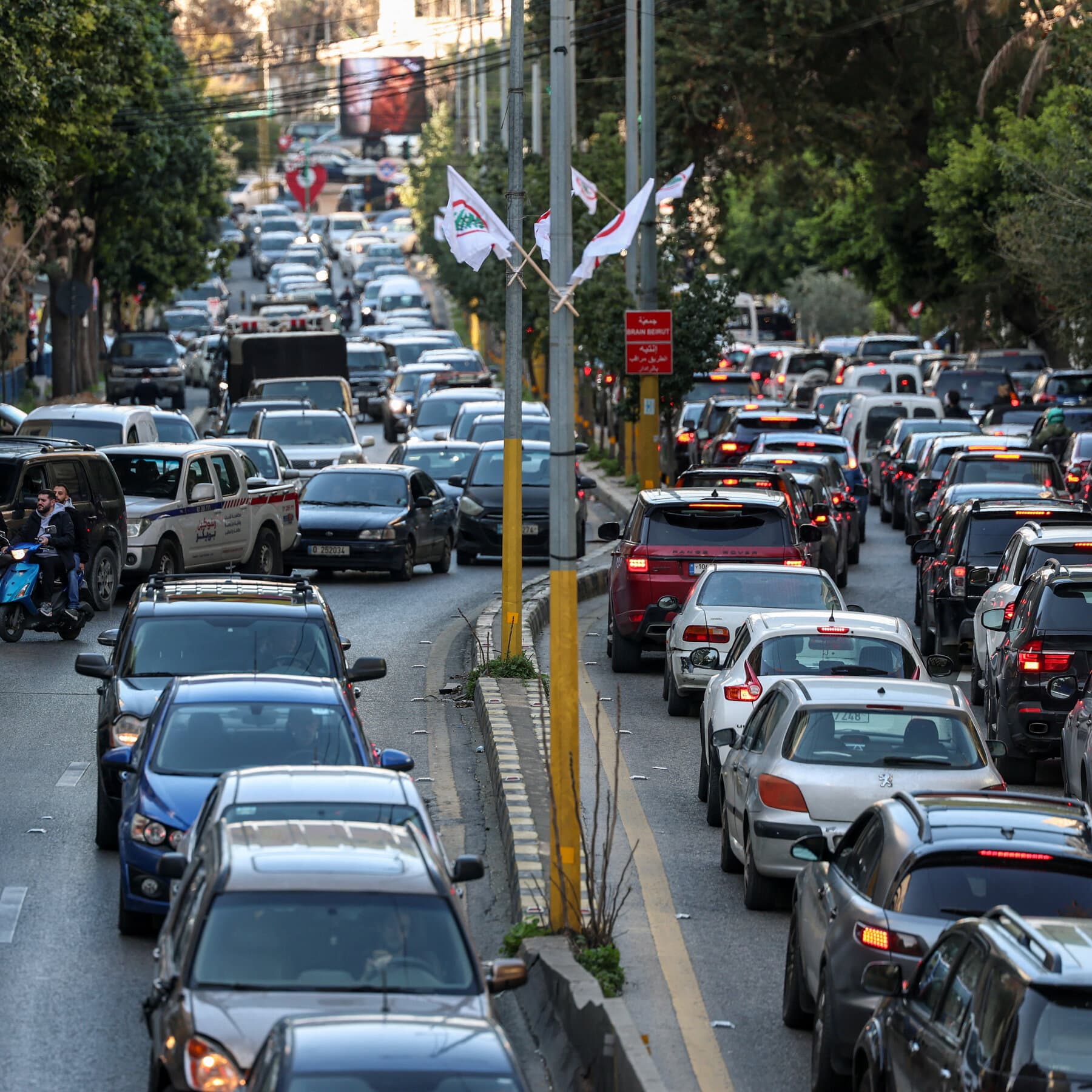 A gritty, high-contrast black and white sketch of a chaotic traffic jam in a dusty middle eastern city street. Desperate people getting out of cars, looking up at the sky in terror. Smoke in the distance. Noir style, heavy shadows.