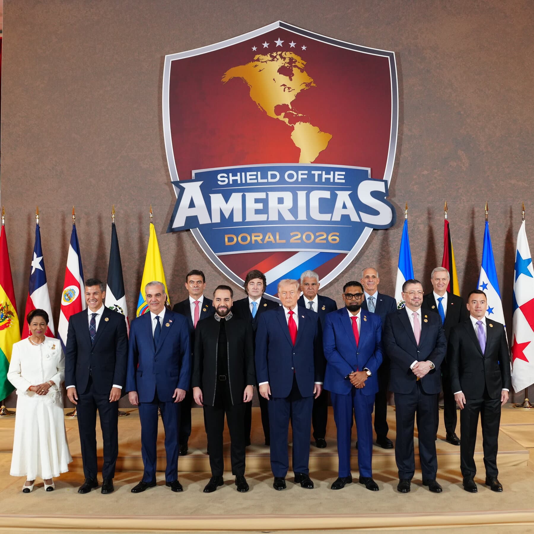 A satirical, high-contrast illustration in a noir style. In the foreground, a pristine, white tablecloth set for a fancy dinner with crystal glasses, but instead of food, the plates are piled with toy soldiers and plastic tanks. In the background, out of focus, silhouettes of men in suits are shaking hands in front of a bright, blinding Florida sun that looks suspiciously like an explosion. The colors should be washed out, mostly greys, stark whites, and deep blacks, emphasizing the hollowness of the scene.