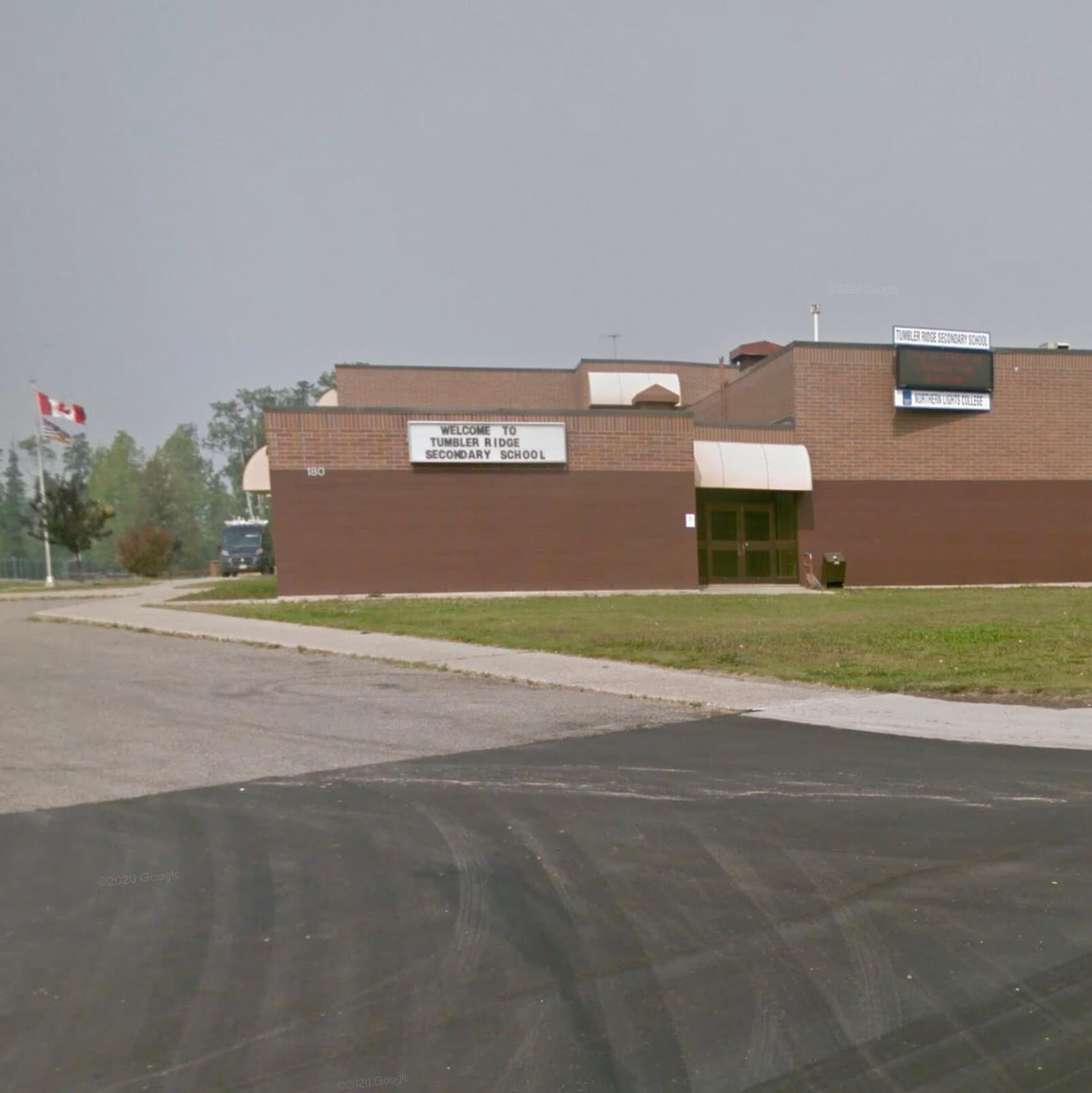 A gloomy, gray-scale view of a majestic mountain range in British Columbia, obscured by a line of bright yellow police caution tape in the foreground, cinematic style, hyper-realistic.